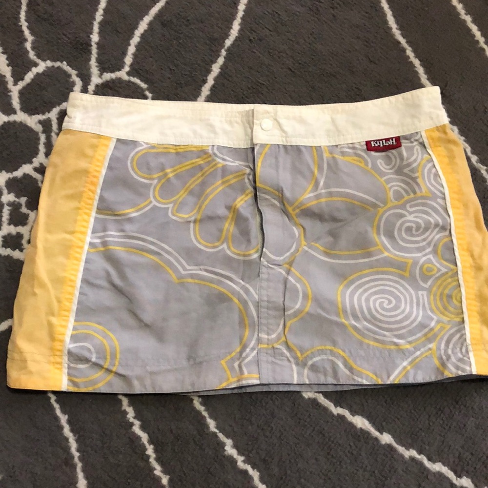 Reversible swimming skirt